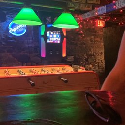a billiards table with neon lights a billiards table with neon lights