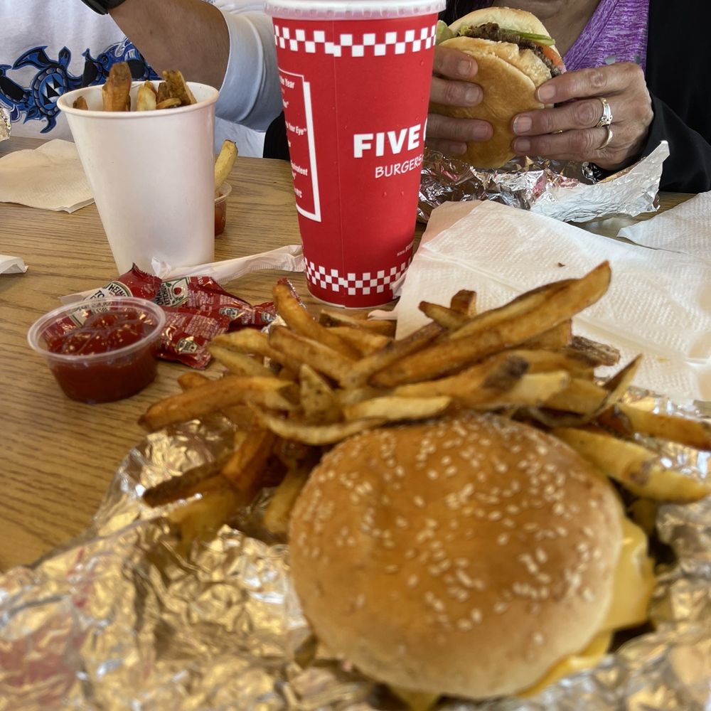 Five Guys - So delicious, but check out mom in the back - Burgers Near Me - Kyle, Texas
