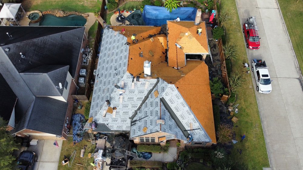 Slide of REAL Roofing and Construction