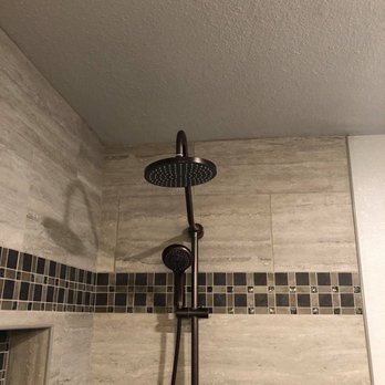 Smith Plumbing - a shower head and shower hose - Plumbing Near Me - Modesto, California Smith Plumbing - a shower head and shower hose - Plumbing Near Me - Modesto, California