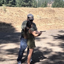 Klamath Sportsmen's Park - Grandpa teaching grand daughter to shoot