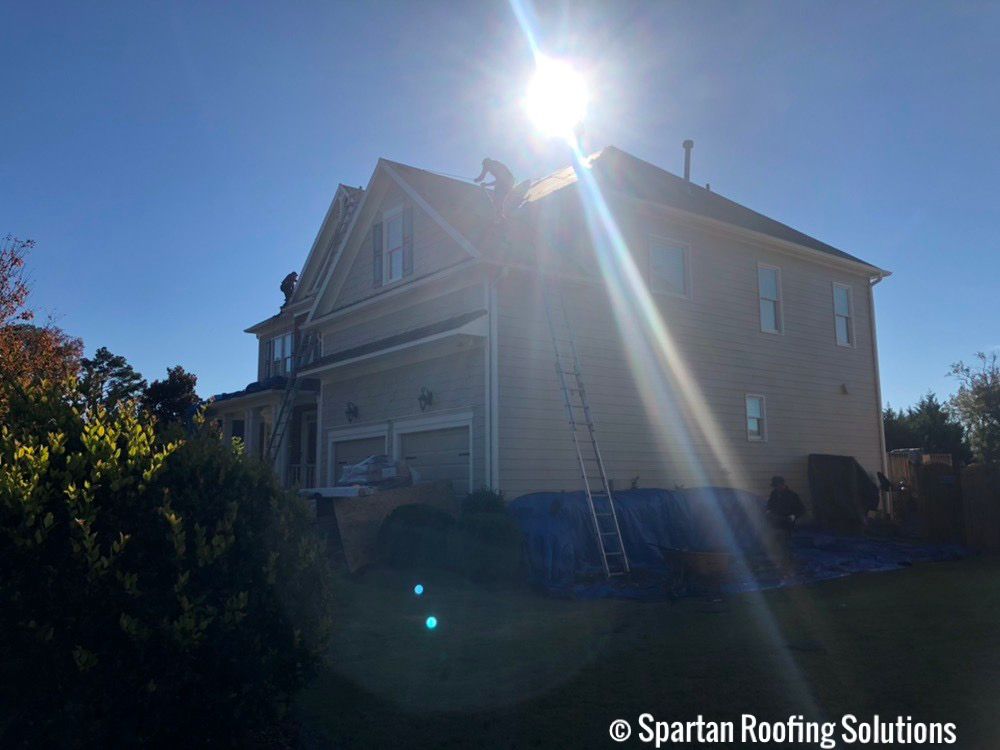 Slide of Spartan Roofing Solutions