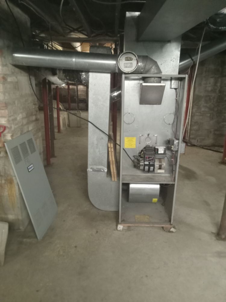 Slide of Kuhn Building services