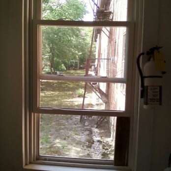 The Mill at Shady Lea - The bathroom window, looking out the back towards the strip of land by the river. - Art Space Rentals Near Me - North Kingstown, Rhode Island The Mill at Shady Lea - The bathroom window, looking out the back towards the strip of land by the river. - Art Space Rentals Near Me - North Kingstown, Rhode Island
