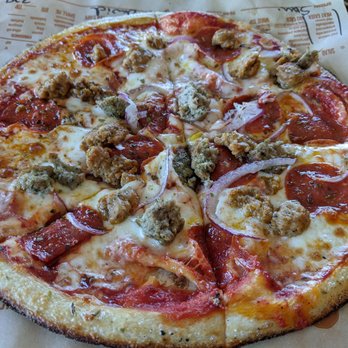 Blaze Pizza - Meat lovers pizza comes with red sauce, red onions, pepperoni and meatballs. I added sausage. - Salad Near Me - Fort Worth, Texas