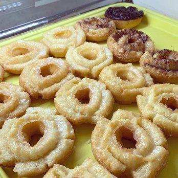 Linden Donuts - a tray of doughnuts on a table - Donuts Near Me - Linden, Texas Linden Donuts - a tray of doughnuts on a table - Donuts Near Me - Linden, Texas