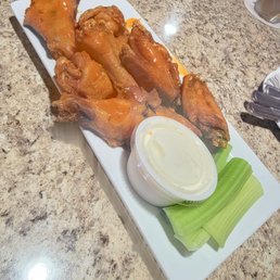 Spicy garlic wings and homemade ranch. Very good Spicy garlic wings and homemade ranch. Very good