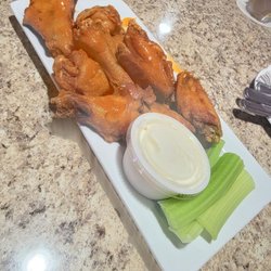 West End Grill & Bar - Spicy garlic wings and homemade ranch. Very good