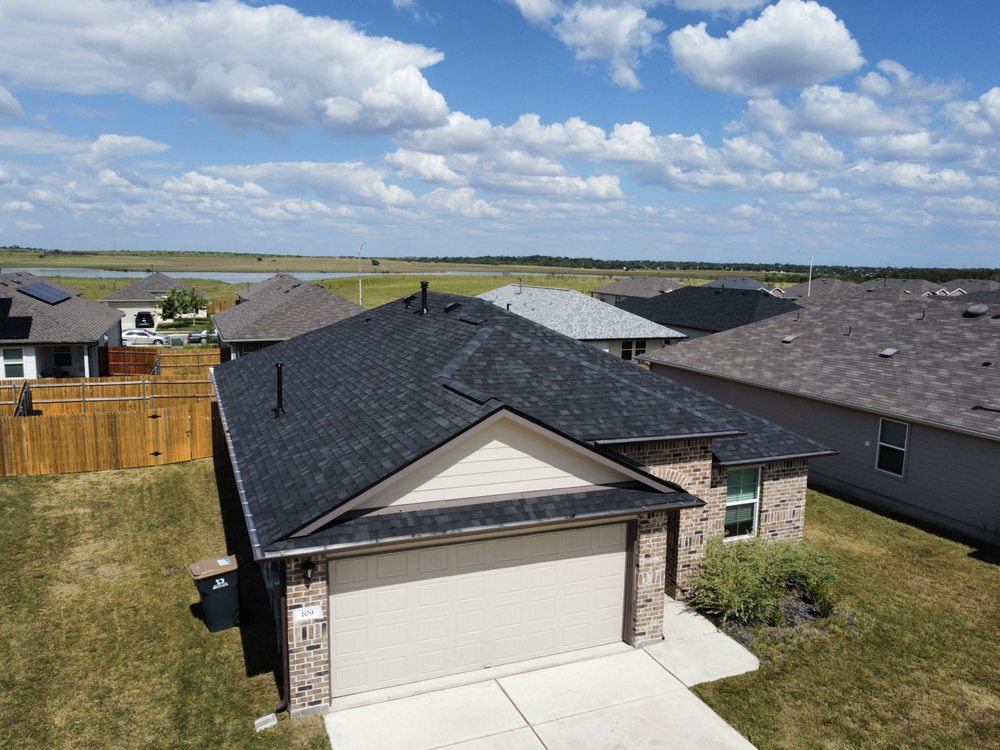 Slide of Bobcat Roofing