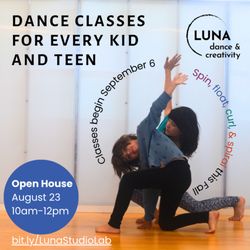 Luna Dance & Creativity - Two children lunging and twisting with arms reaching wide.