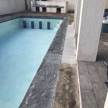 Complete Masonry - Had to completely drain the pool since they deliberately dumped concrete into the pool and damaged the surface - Masonry/Concrete Near Me Complete Masonry - Had to completely drain the pool since they deliberately dumped concrete into the pool and damaged the surface - Masonry/Concrete Near Me