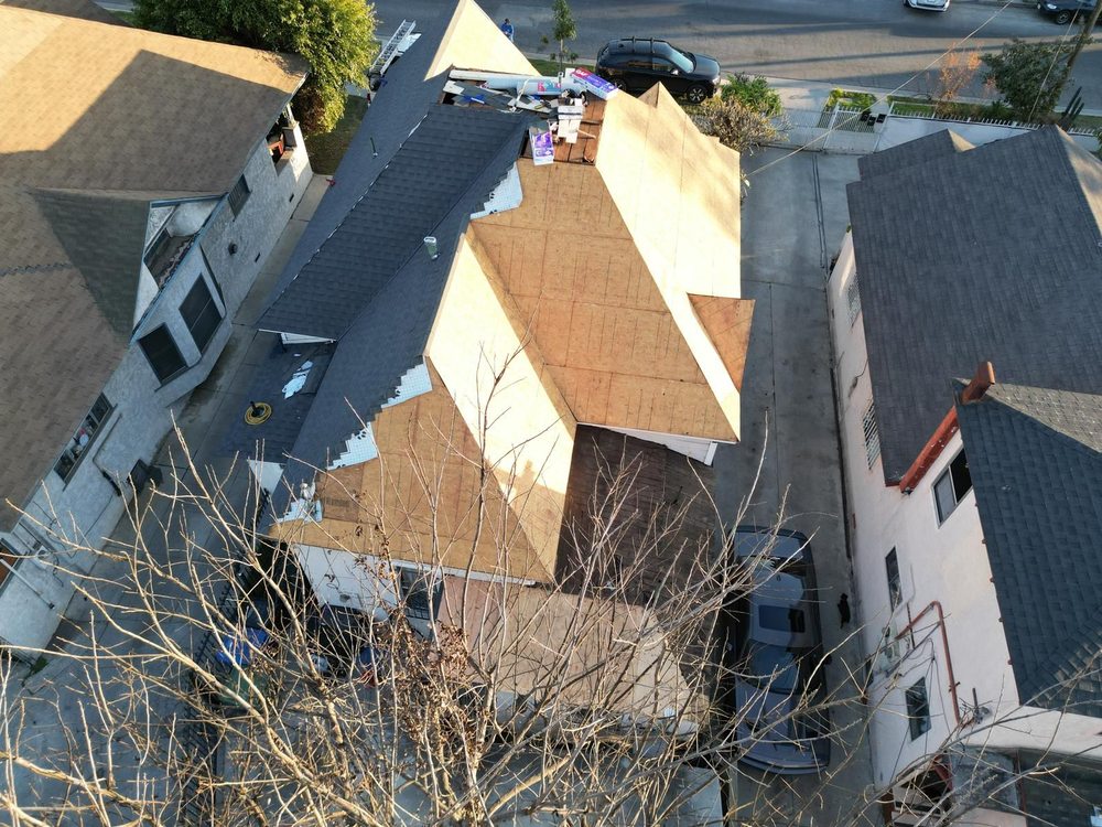 Slide of Tecun’s Roofing