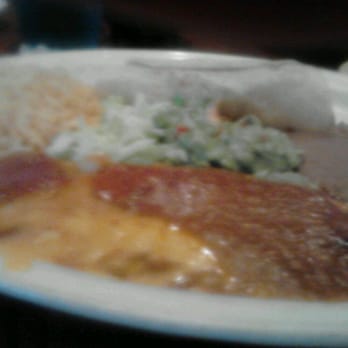 Mama Juanita's - My lunch chicken fajita taco,guacmole,cheese ench, rice and beans - Mexican Near Me - Conroe, Texas