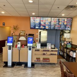 Jungle Kitchen - Inside with digital order kiosks.