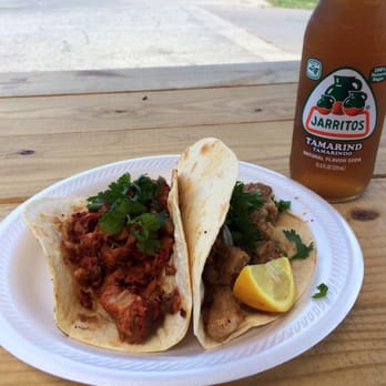 Tacos Guerrero - Al pastor and carnitas tacos with a tamarind Jarritos. - Mexican Near Me - Austin, Texas