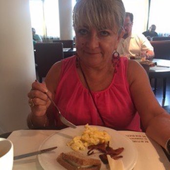 Cosmopolitan Concept Hotel - Corina enjoying a simple breakfast - Hotels Near Me - Florence, FI