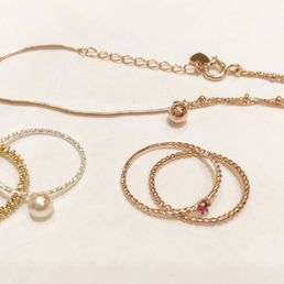 Lots of beautiful rings, bracelets, earrings!! very reasonable price for each accessories Less than $100 with all 5 of them