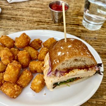 Relish Burger Bistro - Caprese sandwich with tater tots - New American Near Me - Seattle, Washington Relish Burger Bistro - Caprese sandwich with tater tots - New American Near Me - Seattle, Washington