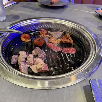 Jeju Island - Our meat in the process of cooking - Korean Near Me - Pearland, Texas