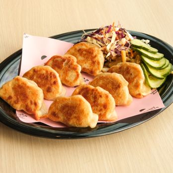 Saturday Dumpling - Our signature dumpling plate comes with 8 pan fried dumplings, rainbow slaw, and assorted pickles. - Chinese Near Me - Minneapolis, Minnesota Saturday Dumpling - Our signature dumpling plate comes with 8 pan fried dumplings, rainbow slaw, and assorted pickles. - Chinese Near Me - Minneapolis, Minnesota
