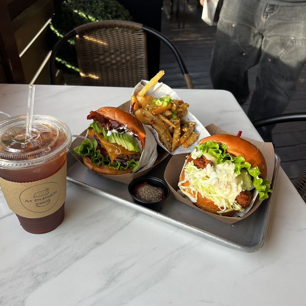 Cali burger on the left, fish burger on the right + pomegranate iced tea