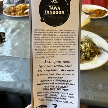 Tawa Tandoor Restaurant - a hand holding a menu - Desserts Near Me - Haverhill, Massachusetts