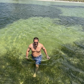 Scallop Cove Too - Hubby enjoying a refreshing dip when we stopped to anchor - Beach Equipment Rentals Near Me
