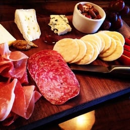 Phenomenal meat & cheese flight complete w/mixed nuts, fresh fruits, honey, & crackers ($14.00) Phenomenal meat & cheese flight complete w/mixed nuts, fresh fruits, honey, & crackers ($14.00)