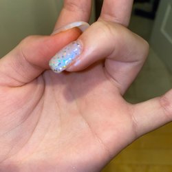 Crystal Nails & Spa - Cut finger