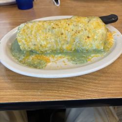 Breakfast burrito with award winning green sauce,chose turkey instead of sausage.