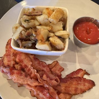 Re:Bar Cafe and Juicestillery - Breakfast potatoes and a generous side of bacon - Breakfast & Brunch Near Me - Tomball, Texas Re:Bar Cafe and Juicestillery - Breakfast potatoes and a generous side of bacon - Breakfast & Brunch Near Me - Tomball, Texas