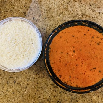 Aariv Indian Cuisine - Butter Chicken with Basmati Rice - Indian Near Me - North Myrtle Beach, South Carolina Aariv Indian Cuisine - Butter Chicken with Basmati Rice - Indian Near Me - North Myrtle Beach, South Carolina