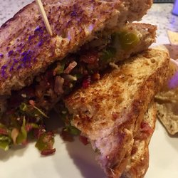 Midtown Market & Lounge - The Rio Hondo Grilled Cheese is light on the cheese but packed full of crispy bacon and spicy green chilies! Hot and delicious!