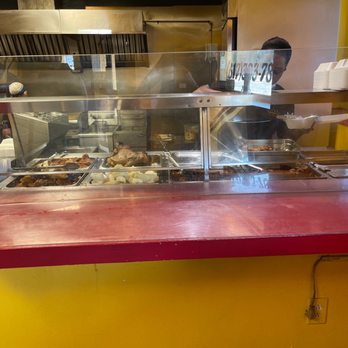Viva Mi Arepa - a man in a kitchen - Venezuelan Near Me - West Roxbury, Massachusetts Viva Mi Arepa - a man in a kitchen - Venezuelan Near Me - West Roxbury, Massachusetts