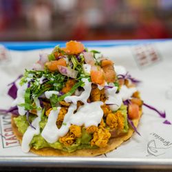 Tostadas with a healthy spin! Instead of refried beans, we offer a generously delicious bed of guacamole!