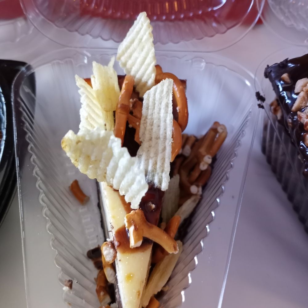 Guy Fieri's Flavortown Kitchen - Beautiful cheesecake with pretzel and potato chips - Food Delivery Services Near Me Guy Fieri's Flavortown Kitchen - Beautiful cheesecake with pretzel and potato chips - Food Delivery Services Near Me