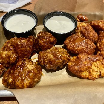 Buffalo Wild Wings - Half Nashville Hot half Teriyaki boneless wings served with blue cheese - Chicken Wings Near Me - Lakeland, Florida
