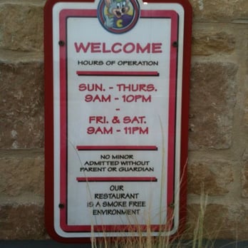 Chuck E. Cheese - a sign for a restaurant - Pizza Near Me - Austin, Texas