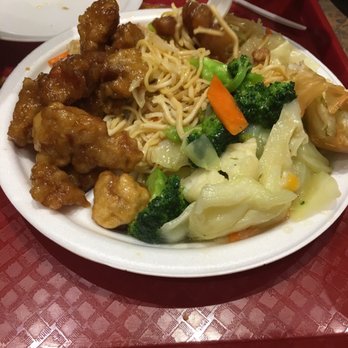 Sizzling Wok - a plate of food on a tray - Fast Food Near Me - Kamloops, British Columbia Sizzling Wok - a plate of food on a tray - Fast Food Near Me - Kamloops, British Columbia