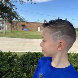 Boy's haircut fade with lightening bolt