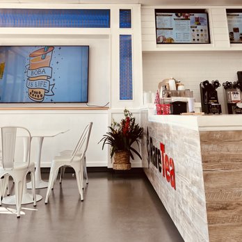 Raretea - Visalia - a coffee shop with tables and chairs - Bubble Tea Near Me - Visalia, California