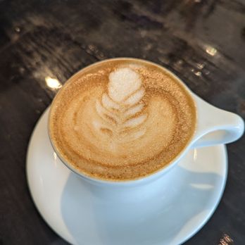 Cavo Coffee - Cappuccino with a pretty flower - Coffee & Tea Near Me - Houston, Texas