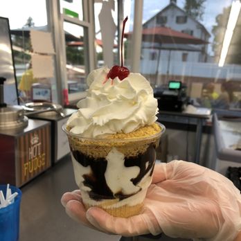 Chuck Wagon Drive In - a hand holding a cupcake - American Near Me - Coplay, Pennsylvania Chuck Wagon Drive In - a hand holding a cupcake - American Near Me - Coplay, Pennsylvania