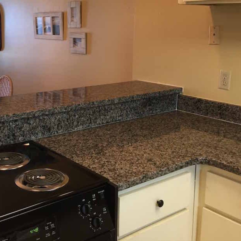 Granite Gallery - Counter corner detail (before cabinet and wall refinishing) - Countertop Installation Near Me - Fort Walton Beach, Florida