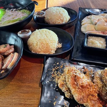 Stick & Steam - Spicy Mala Chicken Noodle Soup (top left) Full Hainan Chicken (top right) Flavored Rice (middle) Typhoon Wings (bottom left) - Dim Sum Near Me - Millbrae, California