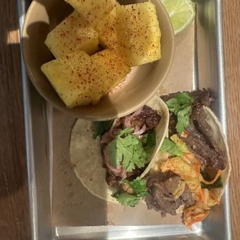 Bartaco - Pineapple w tajin side, pork belly taco, ribeye taco - Tacos Near Me - Miami, Florida Bartaco - Pineapple w tajin side, pork belly taco, ribeye taco - Tacos Near Me - Miami, Florida