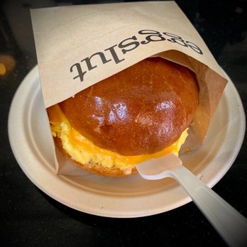 Eggslut - Fairfax - cage-free soft scrambled eggs & chives, cheddar cheese, caramelized onions and sriracha mayo in a warm brioche bun. - Breakfast & Brunch Near Me - Los Angeles, California Eggslut - Fairfax - cage-free soft scrambled eggs & chives, cheddar cheese, caramelized onions and sriracha mayo in a warm brioche bun. - Breakfast & Brunch Near Me - Los Angeles, California
