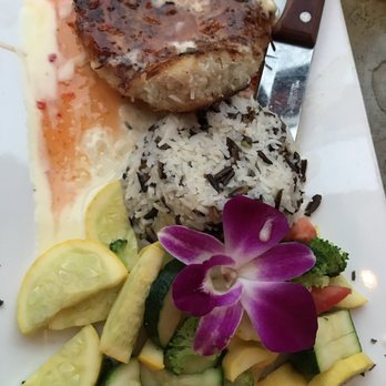 Paradise Beach Grille - Coconut macadamia nut crusted ahí tuna served with wild pilaf and vegetables - New American Near Me - Capitola, California Paradise Beach Grille - Coconut macadamia nut crusted ahí tuna served with wild pilaf and vegetables - New American Near Me - Capitola, California