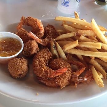 Shrimp Basket - Coconut breaded shrimp with orange marmalade and a side of French fries - Seafood Near Me - Orange Beach, Alabama Shrimp Basket - Coconut breaded shrimp with orange marmalade and a side of French fries - Seafood Near Me - Orange Beach, Alabama