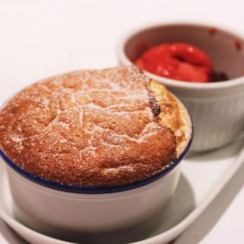Igueldo - Cream cheese soufflé with raspberry ice cream - Basque Near Me - Barcelona, B Igueldo - Cream cheese soufflé with raspberry ice cream - Basque Near Me - Barcelona, B